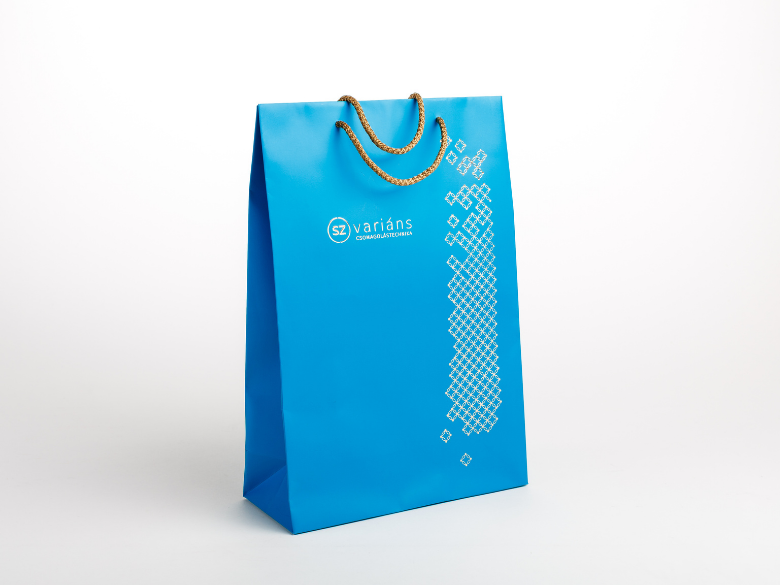 blue lasercut paper bag